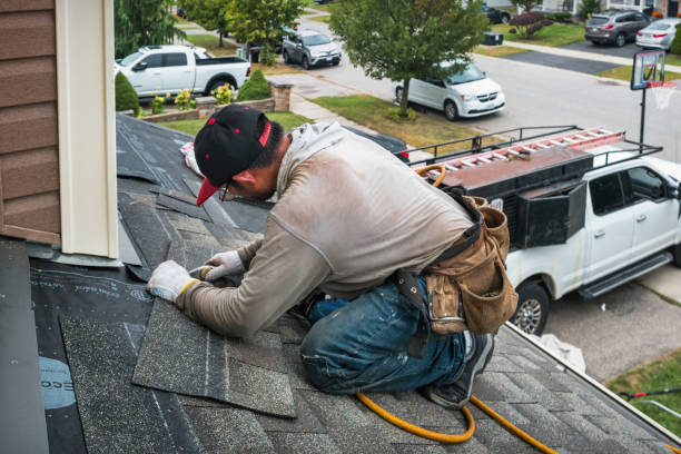 Professional Roofing technician working in Bedias, TX
